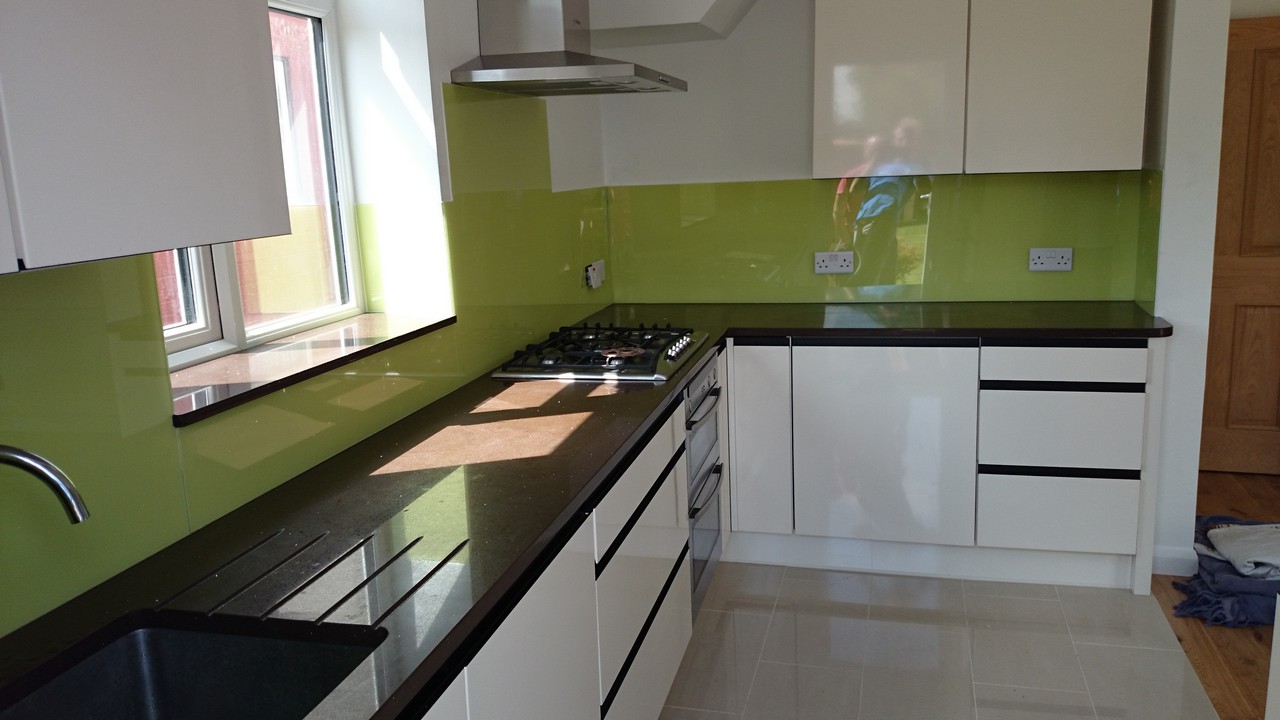 Lime green glass kitchen splashback installed by Forest Hill glaziers