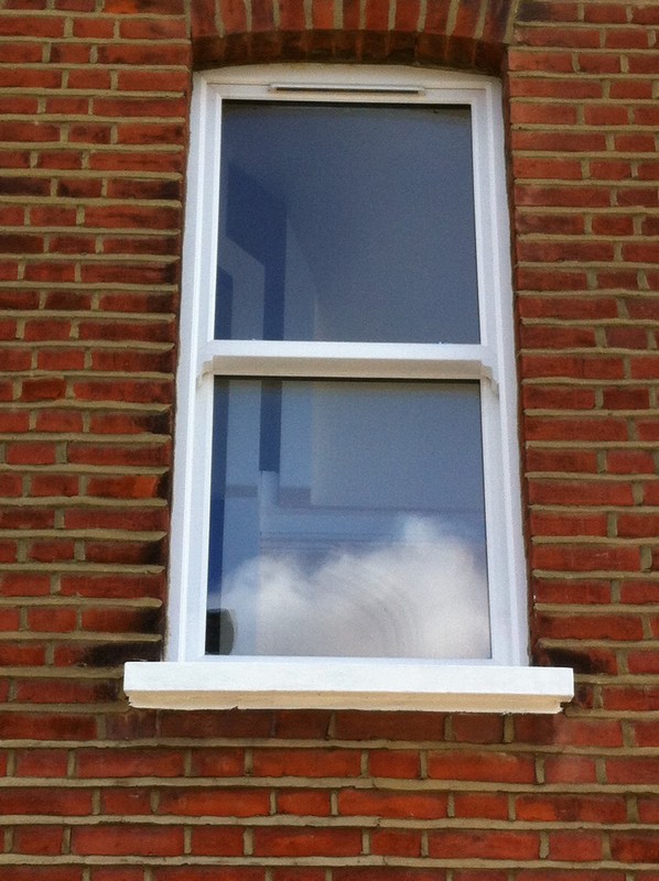 uPVC sash window on Victorian red brick house in Forest Hill